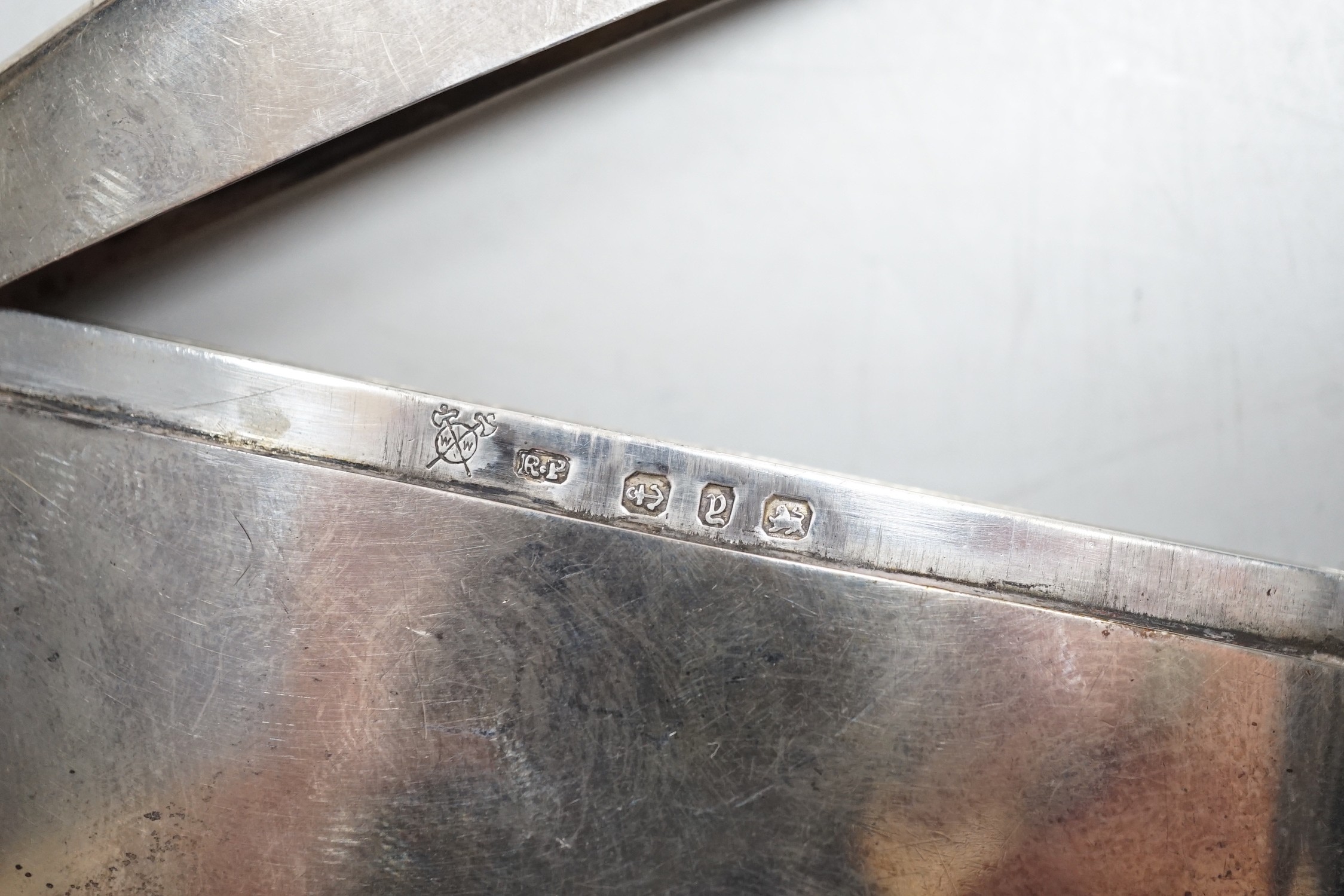 A George V silver two handled bowl, by Sebastian Garrard, London, 1926, 15.5cm, 6.5oz, a silver card case, small silver cup and a Ceylonese white metal posy vase.